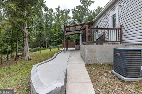 Exterior - 490 Barnes Mill Rd, Hamilton, GA 31811 photo 2 of 13