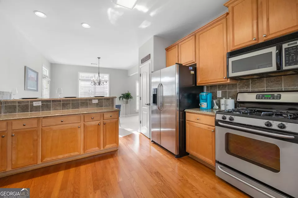 Kitchen - 3660 Lake Pass Ln, Suwanee, GA 30024 photo 2 of 2