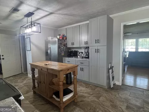 Kitchen - 407 Oasis Dr, Dublin, GA 31021 photo 6 of 6