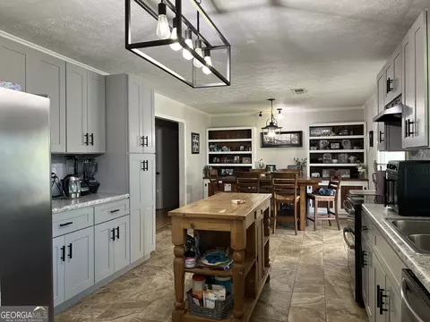 Kitchen - 407 Oasis Dr, Dublin, GA 31021 photo 4 of 6