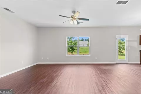 Living - 171 Biscayne Ter, Hampton, GA 30228 photo 4 of 7