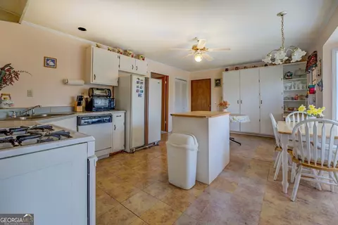 Kitchen - 650 Malcom Rd, Covington, GA 30014 photo 4 of 5