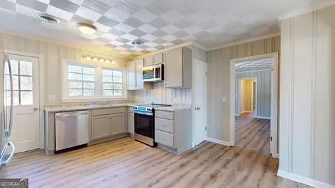 Kitchen - 207 Dixie St, Brooklet, GA 30415 photo 3 of 3