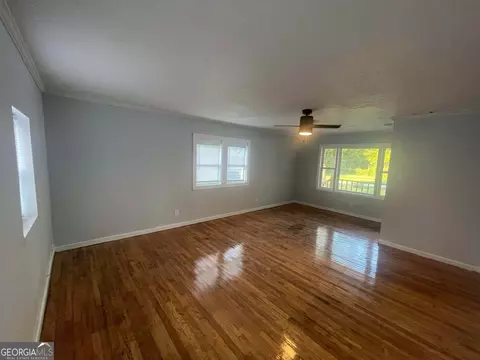 Living - 211 3rd St, Thomson, GA 30824 photo 1 of 2