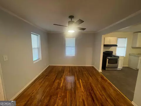 Living - 211 3rd St, Thomson, GA 30824 photo 2 of 2