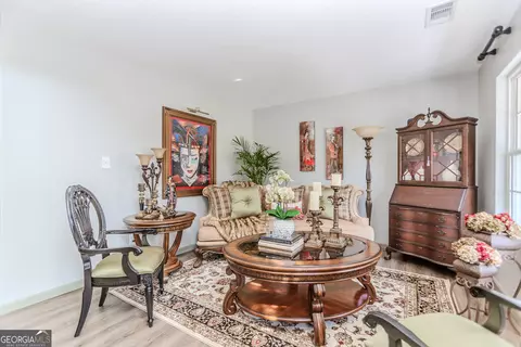 Living - 264 Millstone Dr, Hampton, GA 30228 photo 3 of 4