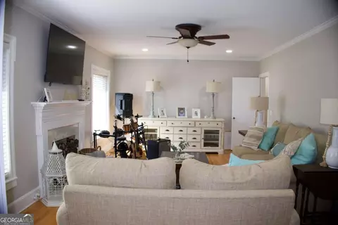 Living - 128 E Leo Trapnell Ave, Lyons, GA 30436 photo 3 of 3