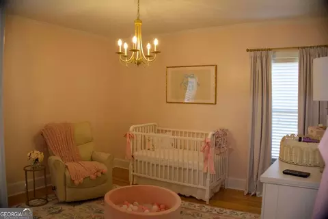 Bedroom - 128 E Leo Trapnell Ave, Lyons, GA 30436 photo 4 of 7