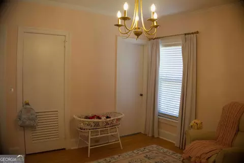 Bedroom - 128 E Leo Trapnell Ave, Lyons, GA 30436 photo 5 of 7