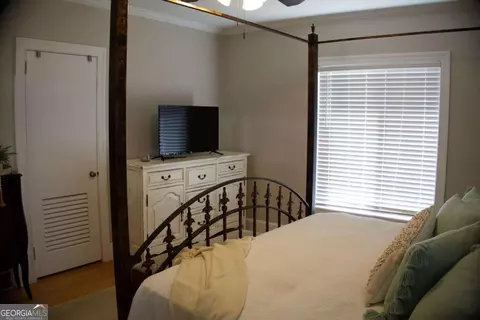 Bedroom - 128 E Leo Trapnell Ave, Lyons, GA 30436 photo 7 of 7