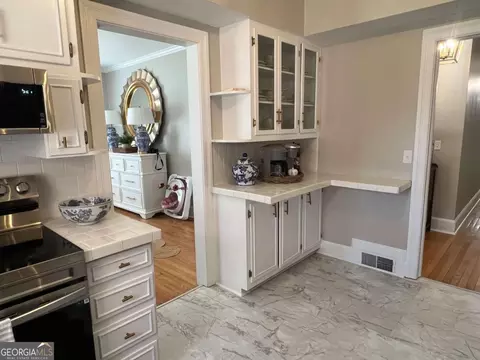 Kitchen - 128 E Leo Trapnell Ave, Lyons, GA 30436 photo 1 of 4