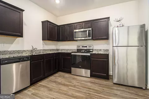 Kitchen - 11882 Fuller St, Hampton, GA 30228 photo 2 of 2