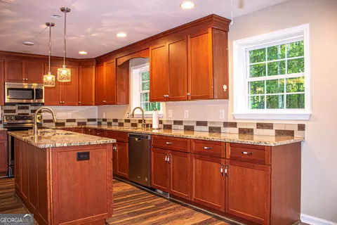 Kitchen - 240 Harkness Rd, Jackson, GA 30233 photo 11 of 12