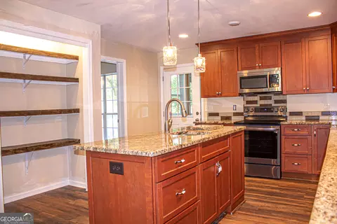 Kitchen - 240 Harkness Rd, Jackson, GA 30233 photo 9 of 12