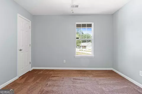Bedroom - 126 Elmwood Dr, Hampton, GA 30228 photo 5 of 6