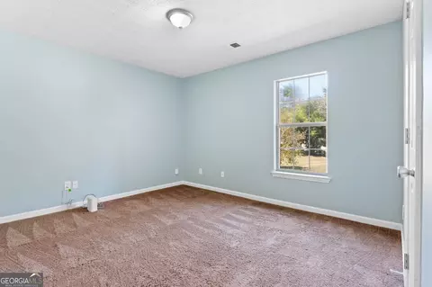 Bedroom - 126 Elmwood Dr, Hampton, GA 30228 photo 3 of 6