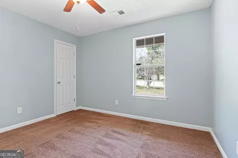Bedroom - 126 Elmwood Dr, Hampton, GA 30228 photo 6 of 6