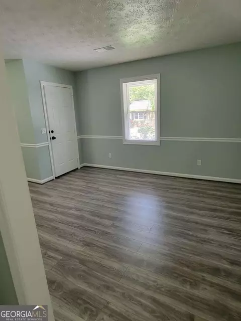 Living - 4648 Pine Tree Cir #B, Buford, GA 30518 photo 1 of 3