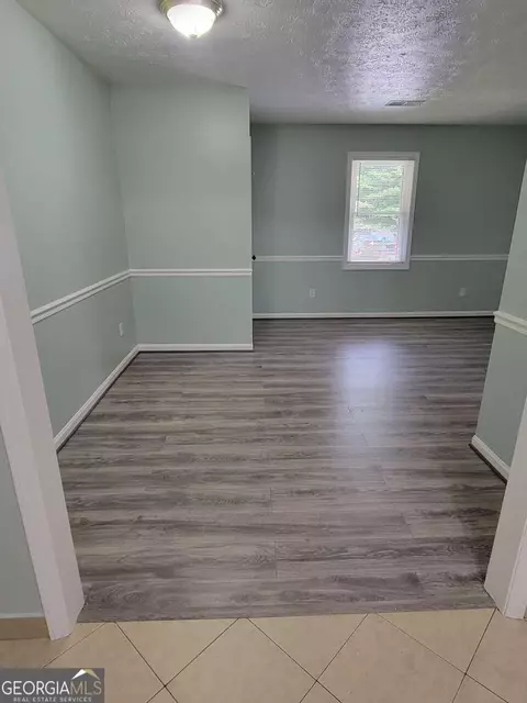 Living - 4648 Pine Tree Cir #B, Buford, GA 30518 photo 3 of 3