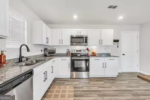 Kitchen - 104 Maple Dr, Milner, GA 30257 photo 3 of 3