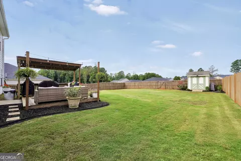 Exterior - 104 Maple Dr, Milner, GA 30257 photo 5 of 9