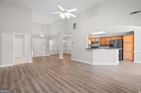 Living - 81 Bridgemill Dr, Hampton, GA 30228 photo 3 of 3