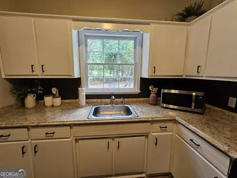 Kitchen - 50 Bates Rd, Covington, GA 30014 photo 2 of 3