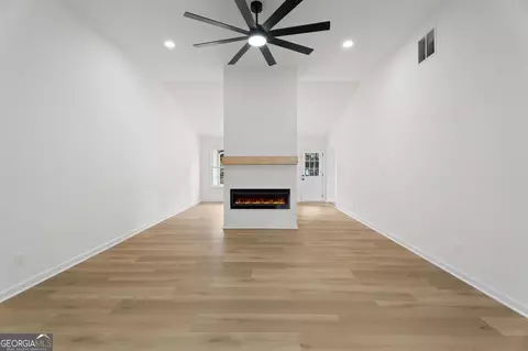 Living - 325 Peachtree Cir, Hampton, GA 30228 photo 4 of 4