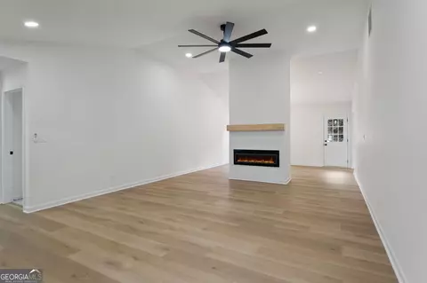 Living - 325 Peachtree Cir, Hampton, GA 30228 photo 3 of 4