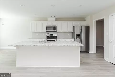Kitchen - 128 Rocky Rd, Perry, GA 31069 photo 3 of 7
