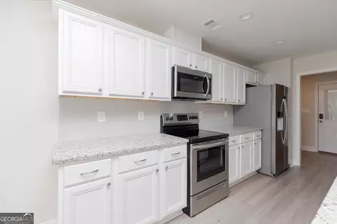 Kitchen - 128 Rocky Rd, Perry, GA 31069 photo 6 of 7