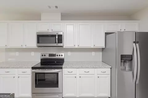 Kitchen - 128 Rocky Rd, Perry, GA 31069 photo 5 of 7