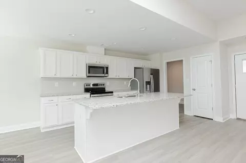 Kitchen - 128 Rocky Rd, Perry, GA 31069 photo 4 of 7