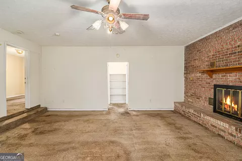 Living - 14908 Brown Bridge Rd, Covington, GA 30016 photo 4 of 5