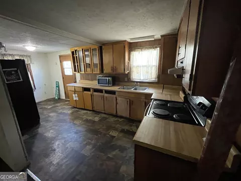 Kitchen - 116 Jackson St, Cochran, GA 31014 photo 1 of 2