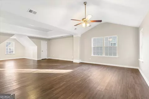 Living - 354 Cobblestone Ct, Hampton, GA 30228 photo 4 of 10