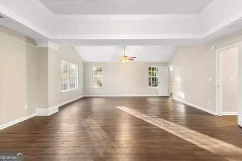 Living - 354 Cobblestone Ct, Hampton, GA 30228 photo 6 of 10