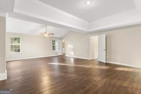 Living - 354 Cobblestone Ct, Hampton, GA 30228 photo 5 of 10