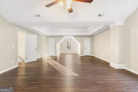 Living - 354 Cobblestone Ct, Hampton, GA 30228 photo 10 of 10