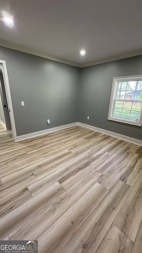 Bedroom - 306 W Wesley Ave, Lyons, GA 30436 photo 2 of 2