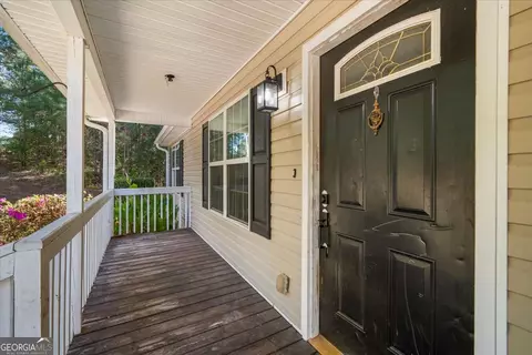 Exterior - 388 High Point Rd, Buchanan, GA 30113 photo 5 of 12