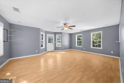 Living - 388 High Point Rd, Buchanan, GA 30113 photo 7 of 10