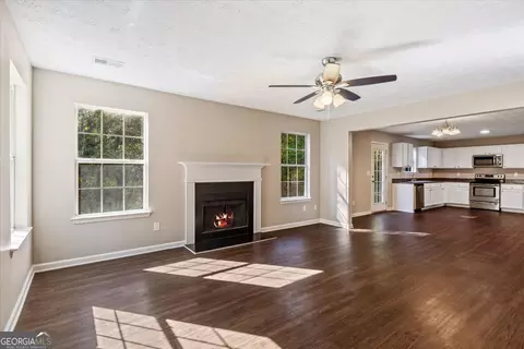 Living - 221 Millstone Dr, Hampton, GA 30228 photo 6 of 8