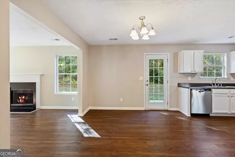 Living - 221 Millstone Dr, Hampton, GA 30228 photo 5 of 8