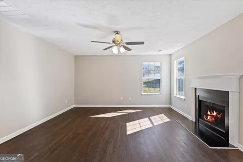 Living - 221 Millstone Dr, Hampton, GA 30228 photo 4 of 8