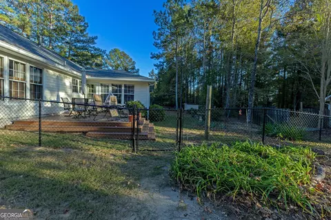 Exterior - 10990 Clearwater Dr, Hampton, GA 30228 photo 12 of 15