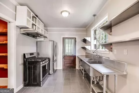 Kitchen - 427 E College St, Bowdon, GA 30108 photo 2 of 3