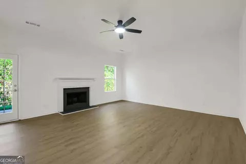 Living - 1432 Shadow Creek Ave, Hampton, GA 30228 photo 2 of 3