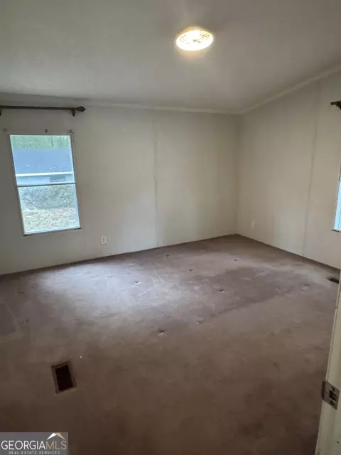 Bedroom - 105 Skyline Dr, Hampton, GA 30228 photo 1 of 4