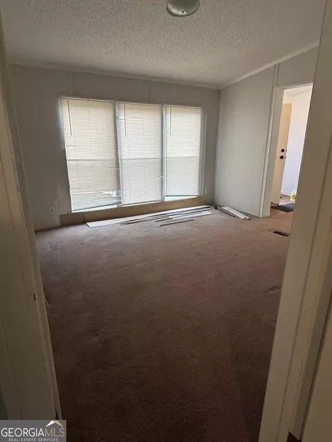 Living - 105 Skyline Dr, Hampton, GA 30228 photo 1 of 2